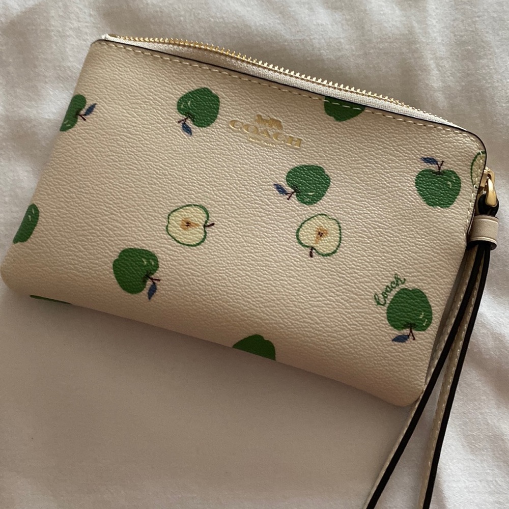 Small coach clutch wallet.